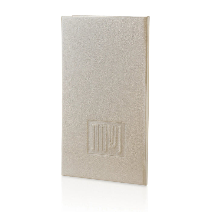 Tan leather Nishmas booklet with embossed cover design, closed view showing spine and front cover of this compact prayer book.