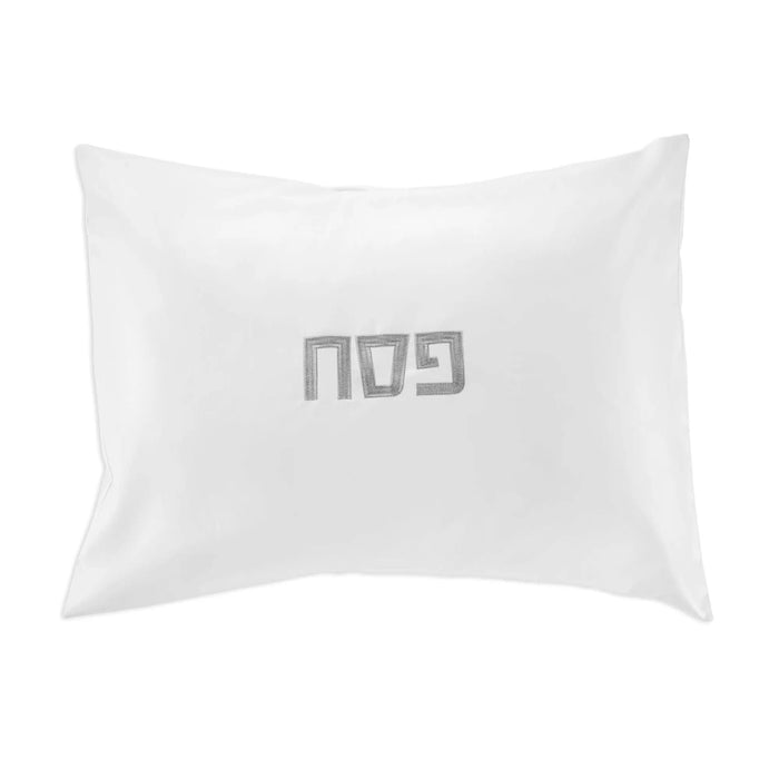 White leather pillow case with embroidered Pesach text design by Waterdale Collection