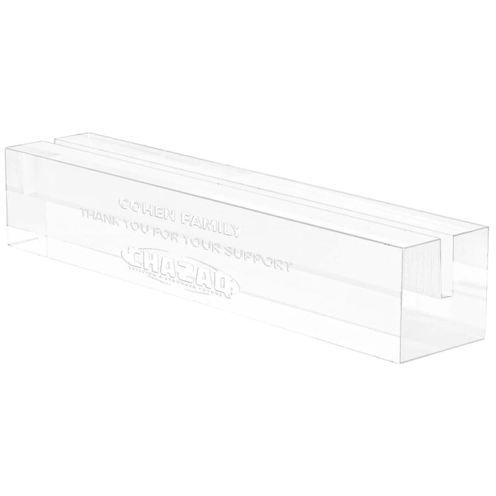 Clear acrylic personalization book stand with embossed text display area, ideal for customizing hardcover books with monograms or names.