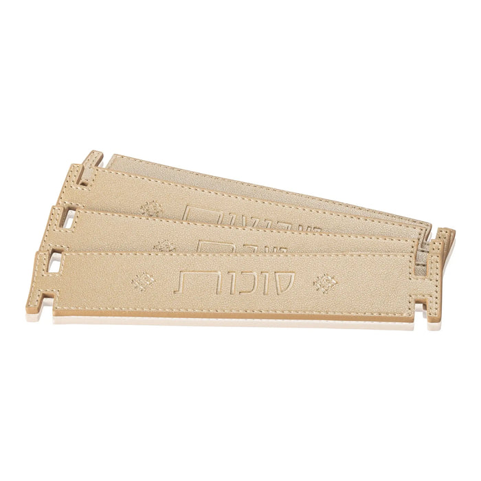 Beige leather strap napkin holder with metal accents and binding details by Waterdale Collection