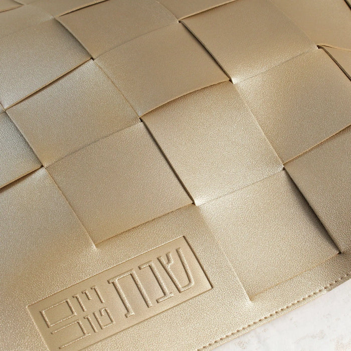 Cream woven leather challah cover with quilted basket weave pattern from Waterdale Collection for Shabbat.