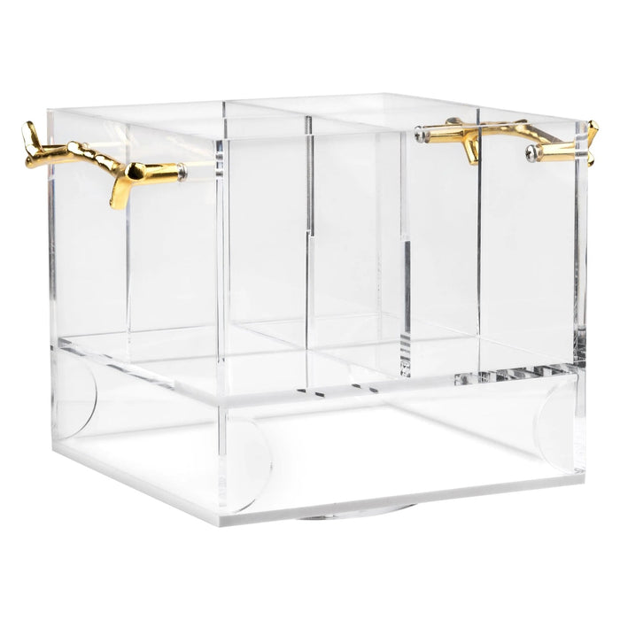 MetaLucite Twig Swivel Silverware Caddy in clear acrylic with brass gold twig-shaped handles and divided compartments for organizing flatware and utensils on the table.
