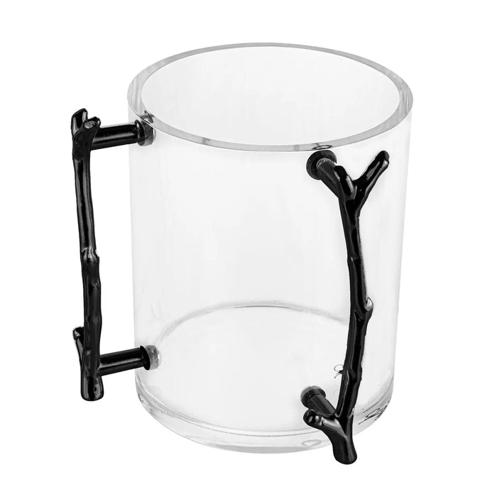Clear glass washing cup with black metal twig-inspired handles, perfect for Shabbat and holiday rituals.