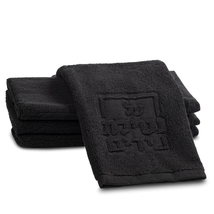 Black embossed finger towel from Waterdale Collection for netilas yadayim hand washing, folded stack display.