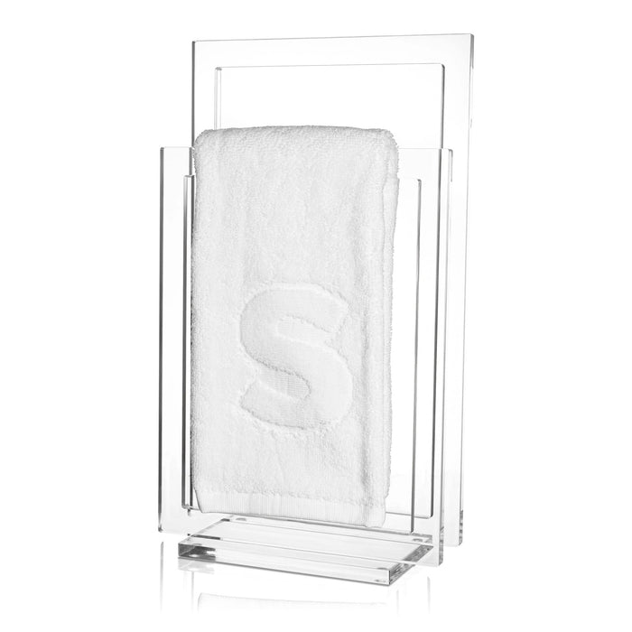 Clear acrylic modern finger towel stand by Waterdale Collection displaying a folded white towel, featuring a minimalist rectangular design for bathroom or vanity display.