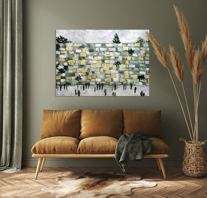 Modern Kosel Painting by Waterdale Collection featuring an abstract Jerusalem landscape in muted earth tones, displayed above a tan leather sofa in a contemporary living room setting.