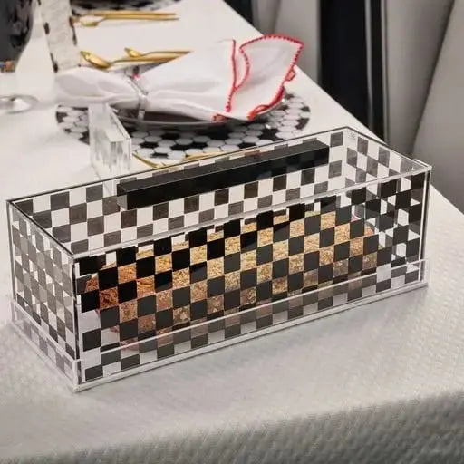 Clear Onyx Cake Dome with black and white checkered pattern, displaying decorative gold-toned pieces inside, elegant serveware for entertaining.