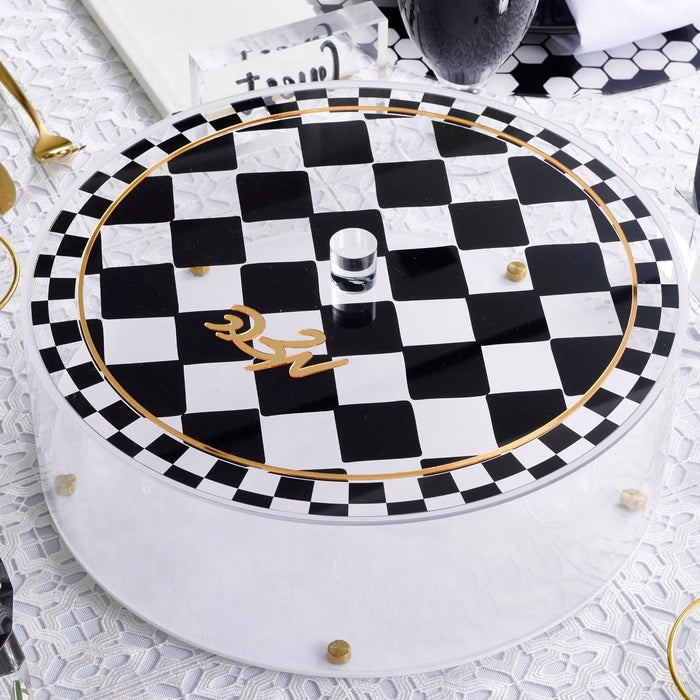 Black and white checkered Onyx Matzah Box by Waterdale Collection with gold accents, displayed on white surface for Pesach Seder.