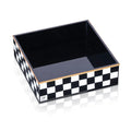 Onyx Napkin Holder with black and white checkered pattern design and black interior compartment for tabletop use.