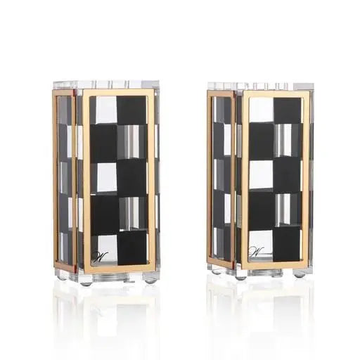 Pair of Onyx Salt Shakers by Waterdale Collection featuring black and white checkered pattern with chrome accents and handles.