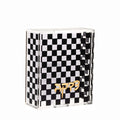 Black and white checkered Onyx Tzedakah box with gold accents, perfect for Shabbat and holiday giving.