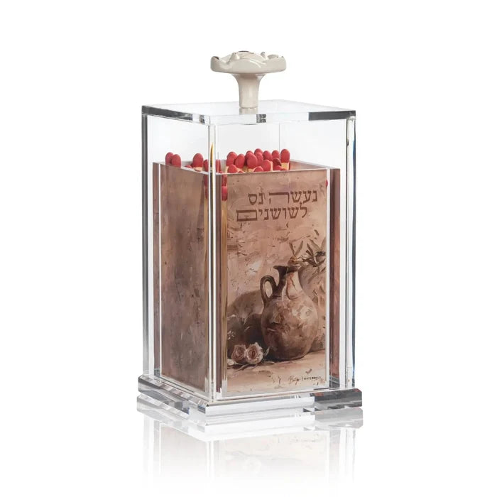 The Painted by Batya Chanukah Match Jar in painted Lucite with its magnetic cover, part of the Batya Chanukah set