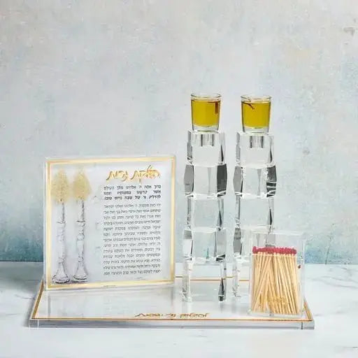 Painted by Judy Neiros block tabletop candle-lighting set with wooden base, featuring instruction card and gold-accented glass holders for Shabbat.