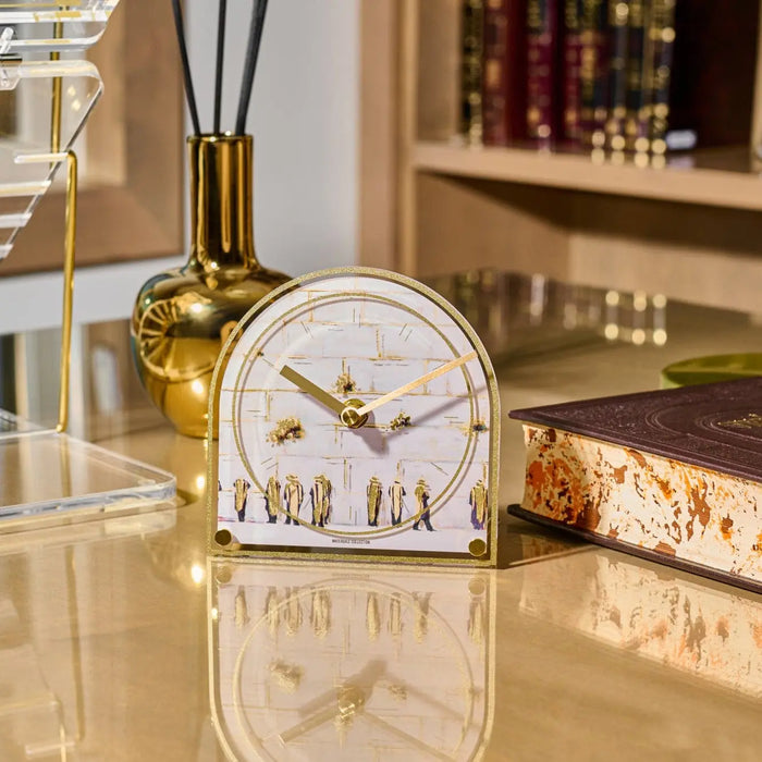 Painted by Judy Kosel white and gold desk clock with metal frame on marble surface, styled with books and home décor in background.