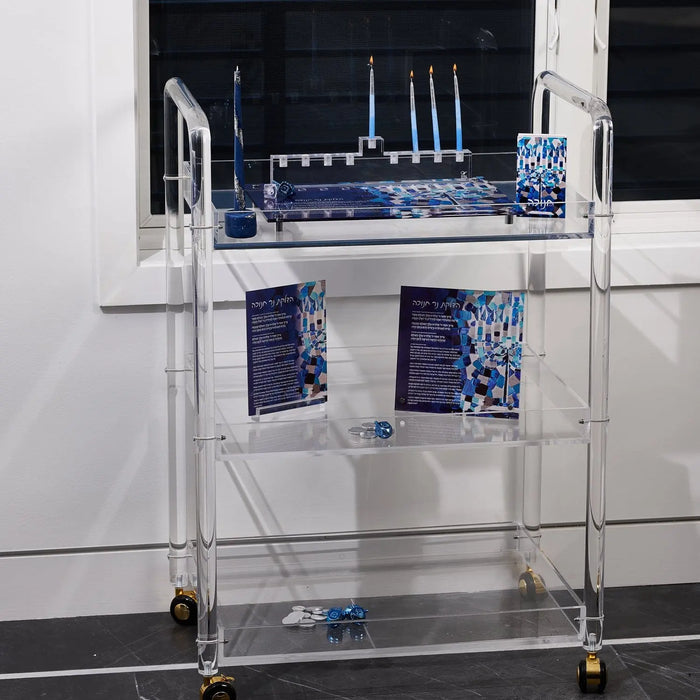 Painted Mosaic Menorah Tray styled with candles and Hanukkah decor, a raised Lucite tray on four standing pegs
