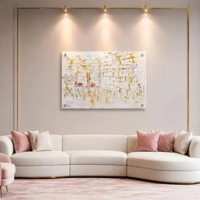 Painted Pastel Kosel by Yosefa hanging above a curved white sofa in a modern living room with soft lighting and pink accents.