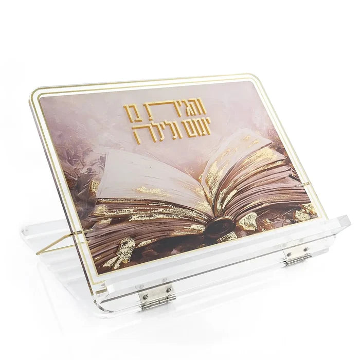 Painted Sefer foldable shtender with open book design, white acrylic frame holding religious text, tabletop display stand.