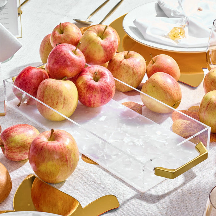 Pearlstone marble bread tray filled with fresh apples and pastries, displayed on white surface with gold accents and table setting