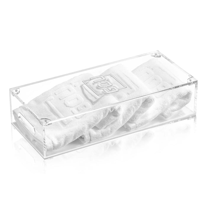 Clear lucite Pesach towel box containing folded white towels, designed for Passover netilas yadayim hand washing rituals and holiday table decor.