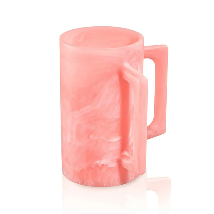 Coral pink resin washing cup with handle, featuring a marbled texture and smooth cylindrical design for bathroom or kitchen use.