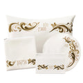 Prestige Pesach Set with gold ornamental designs on white leather placemats, napkins and matching tableware pieces from Waterdale Collection.