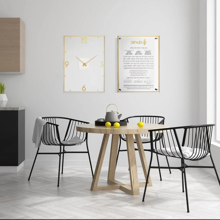 Rectangular classic wall clock with minimalist design displayed above a wooden dining table with black chairs in a modern home setting.