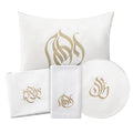 Regal Pesach Set in white and gold leather featuring matching pillow, napkins, and round plate for holiday table décor.