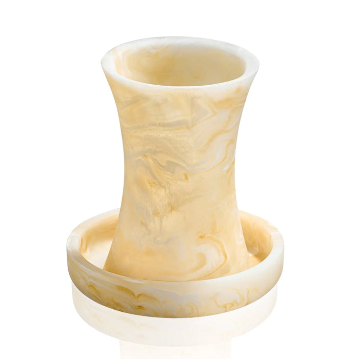 Cream-colored resin Kiddush cup with textured surface and flared rim, shown with matching base plate from Waterdale Collection