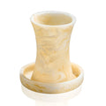 Cream-colored resin Kiddush cup with textured surface and flared rim, shown with matching base plate from Waterdale Collection