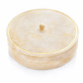 Cream-colored resin matzah box with lid, featuring a classic round design for Passover tabletop storage