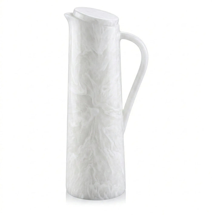White resin pitcher with textured twig pattern design, featuring a handle and pouring spout, ideal for table service.