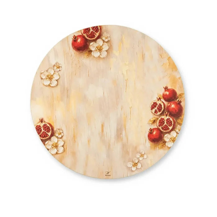 Painted pomegranate charger layered under a Jewish New Year place setting (ראש השנה)