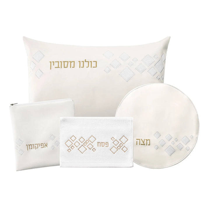 Scattered Fur Pesach Set by Waterdale Collection featuring white leather accessories with gold embroidered details, including pillow, plate, and matching items for holiday table settings.