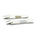 Two white leather Square Havdalah sets with embroidered Hebrew text labels for spices and besamim, displayed side by side.