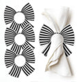 Stripe Bow Napkin Rings in black and white striped pattern with metallic accents, displayed as a set of elegant table linens for formal dining and entertaining.