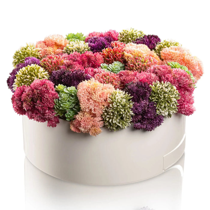 Succulent Pink Round Vase Bencher Set featuring faux multicolored mums in pink, coral, purple, and green tones arranged in a white ceramic vase.