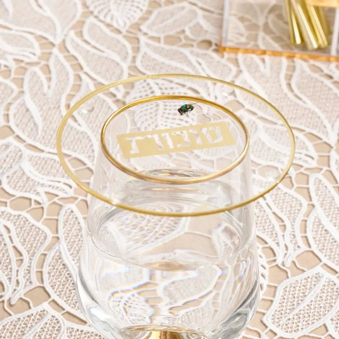 Sukkos cup cover set over a drink on the sukkah table, 4.5" Lucite cover for Sukkot (סוכות)