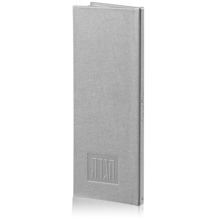Tall Leather Painted Haggadah in gray leatherette with embossed design, standing upright against white background