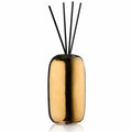 Gold Fluted Scent Diffuser by Waterdale Collection with black reeds, elegant cylindrical design for home fragrance.