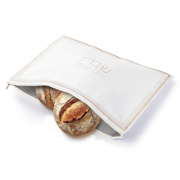 White and gold leather Trinket Challah Pouch Cover with a fresh challah loaf partially visible inside, perfect for Shabbat table settings.