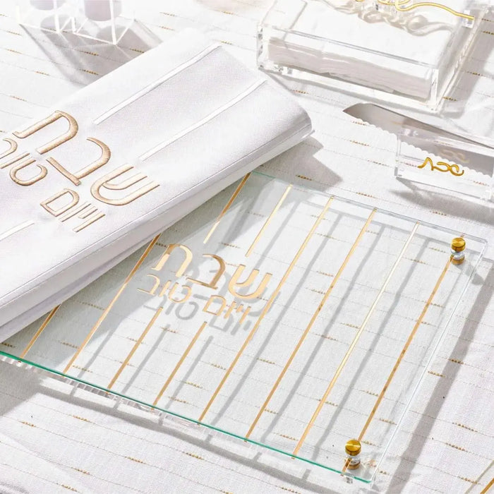 Gold vertical stripe challah board and matching cover set with gold accents on white background