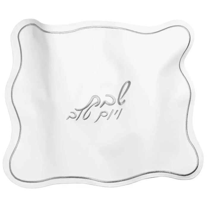 White leather wavy challah cover with embroidered Hebrew text, perfect for Shabbat table settings and Jewish celebrations.