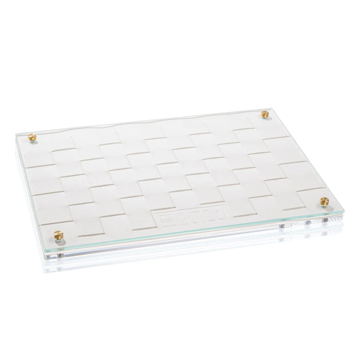 Woven challah board with white woven pattern and leather corner accents, displayed at an angle against a white background.