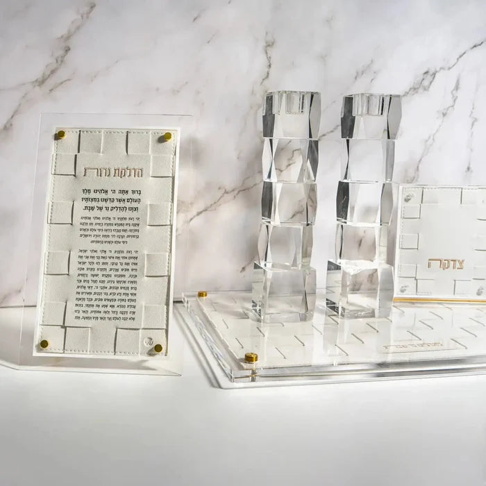 Woven Hadlokas Neiros candle-lighting plaque in cream and gray tones with folded fabric design and printed blessings card.